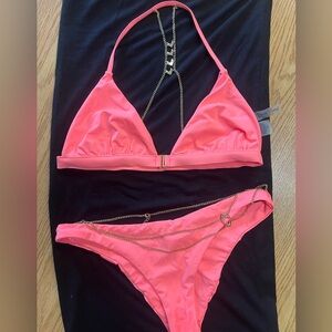 Beach Bunny coral 2 piece bikini with gold chain detail.